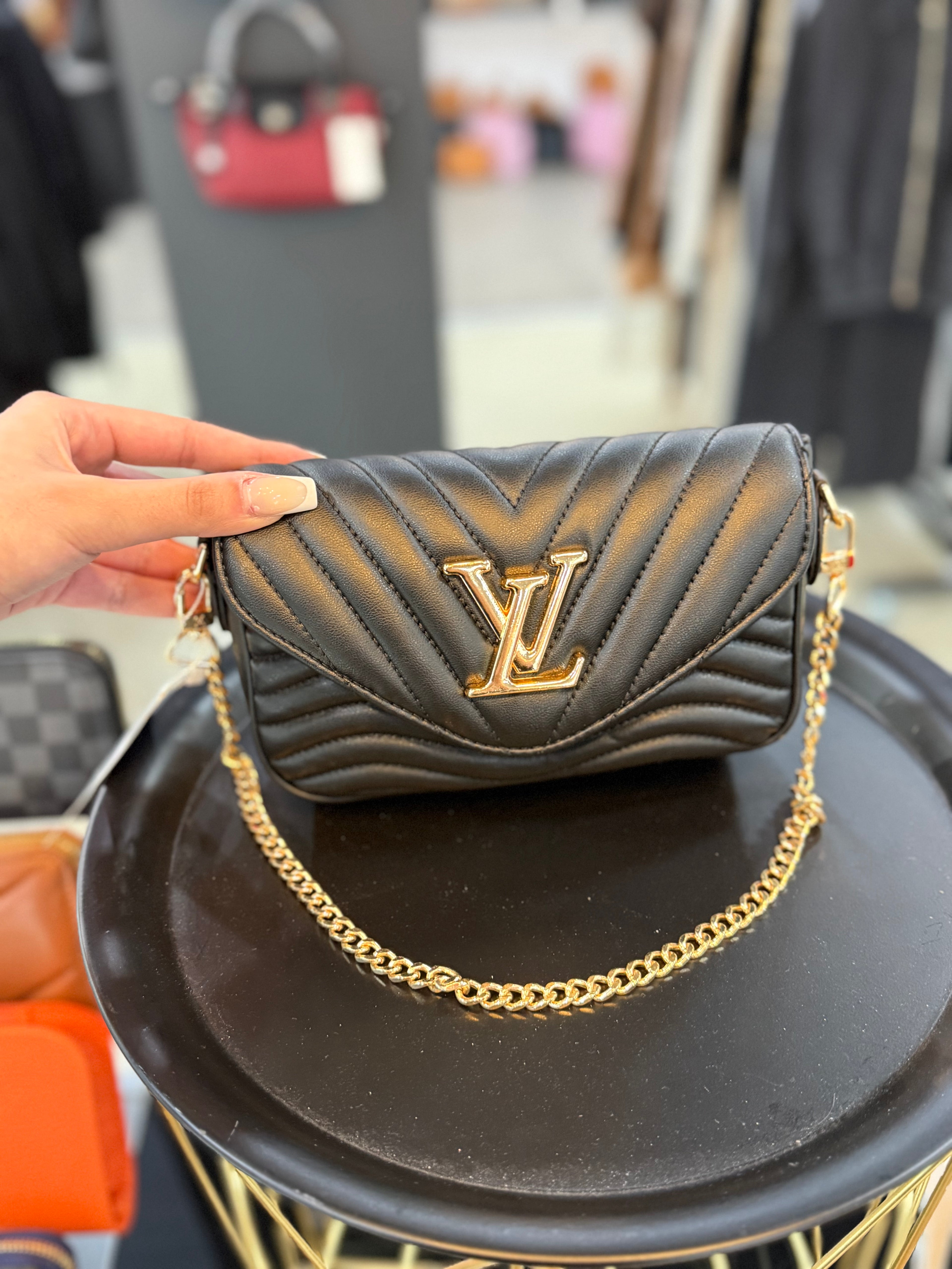 Louis Vuitton μαύρο-χρυσό